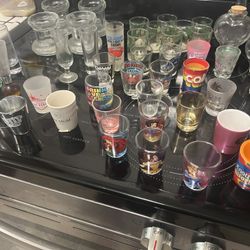 Shots Glasses And Glass Candles 
