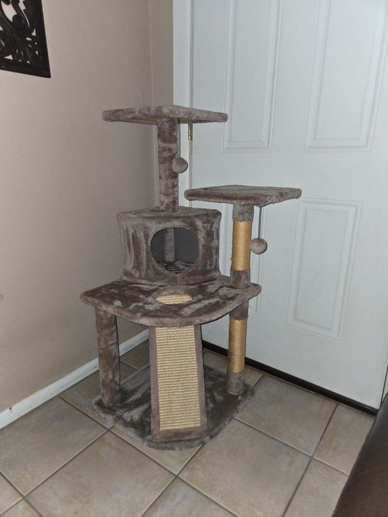 Cat tower with scratching ladder and posts three tiered