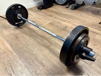 Olympic  Curl Bard & Missmatch Cast Iron Weight Plates 25s, 10s and 5s . Total: 97 lbs