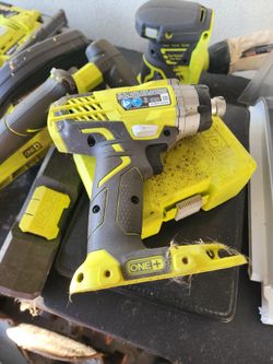 Assorted Ryobi tools and bits.