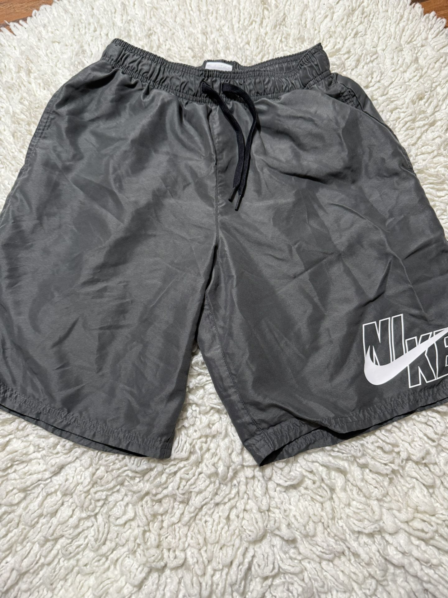 SWIM SOLID COLOR SWIM SHORTS WITH PRINTED LOGO Small on tag