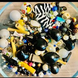 Pretty rocks, trinkets and old beads. 