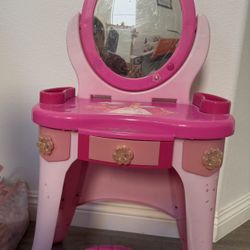 Kids makeup vanity with pretended makeup kit