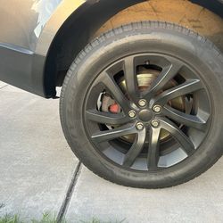 Range Rover stock 20” black rims