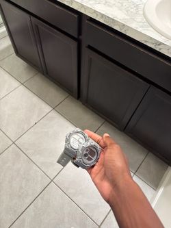 2 gray g-shock casio watches