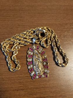 14k Virgin Marie Neglace. ($4900 OBO)