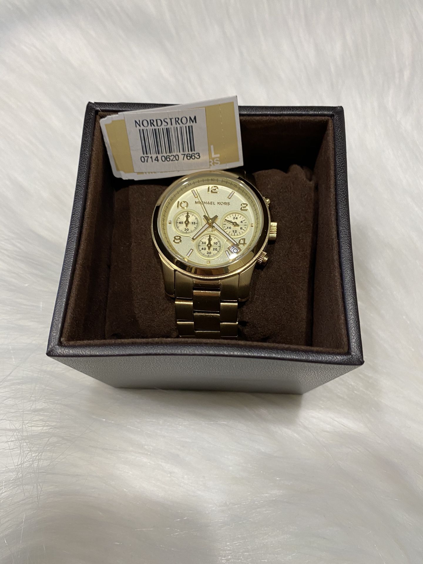 Brand new never used women’s Michael Kors gold watch purchased from Nordstrom’s with original tags.