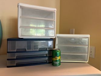 Three plastic storage organizers/ containers