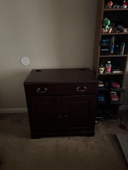 Dark Wood Cabinet with Drawer and Doors