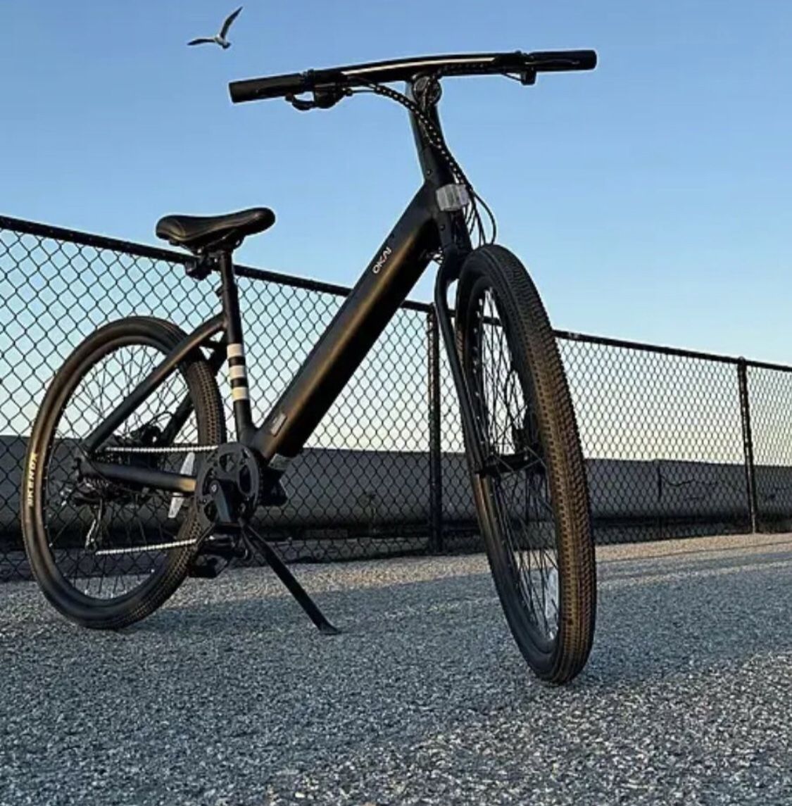 6583834 Okai Lytecycle EB60 minimalist fitness step through E bike w / up to 62 miles max operating range and 20mph max speed matte black