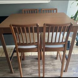 Table and four chairs from Ikea in good condition