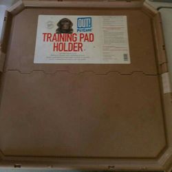 Training pad holder