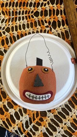 Primitive felt jack-o’-lantern hanger