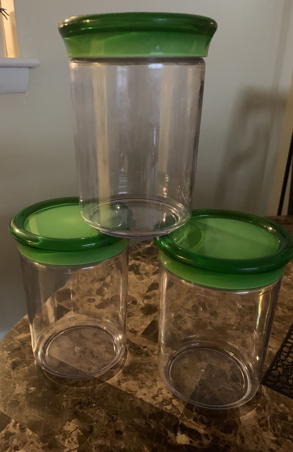 3 Acrylic storage containers. $8