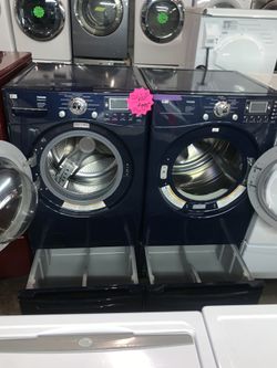 LG front load washer and matching electric dryer with pedestals in excellent conditions with 4 months warranty