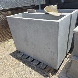 CONCRETE PLANTERS  $450 EACH.