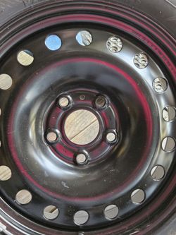 Very New Tire And Rim.