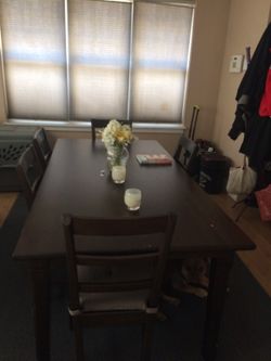 IKEA brown table and 4 chairs for sale