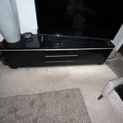 MOVE OUT SALE- TV stand With 55 Inch TV 