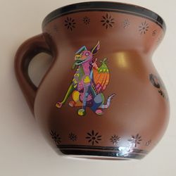 Disney Pixar COCO Mug Cup Dante and Dia de los Muertos Miguel Version. 
Pre-owned, good shape, no chips or cracks. Please see photos for details.
It i