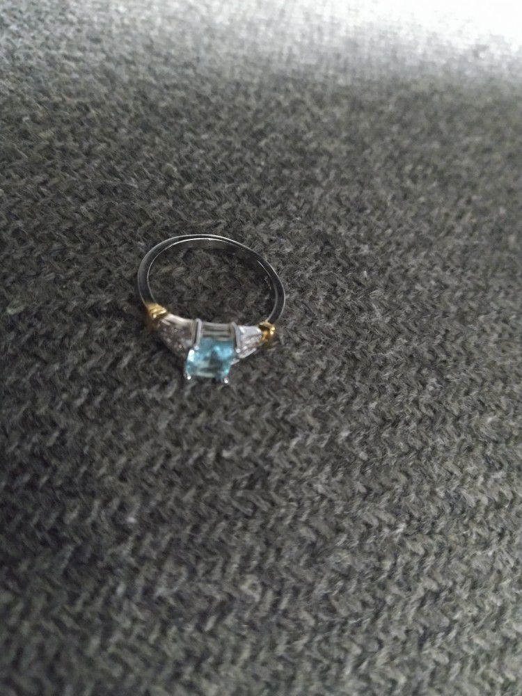  Silver And Gold Plated Ring With Light Blue Stone