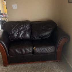 Ashley Furniture Leather Couch And Love Seat Set ! Must Have A Truck Upon Pick Up Very Heavy