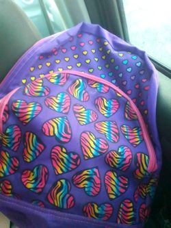 Brand new purple with hearts backpack.