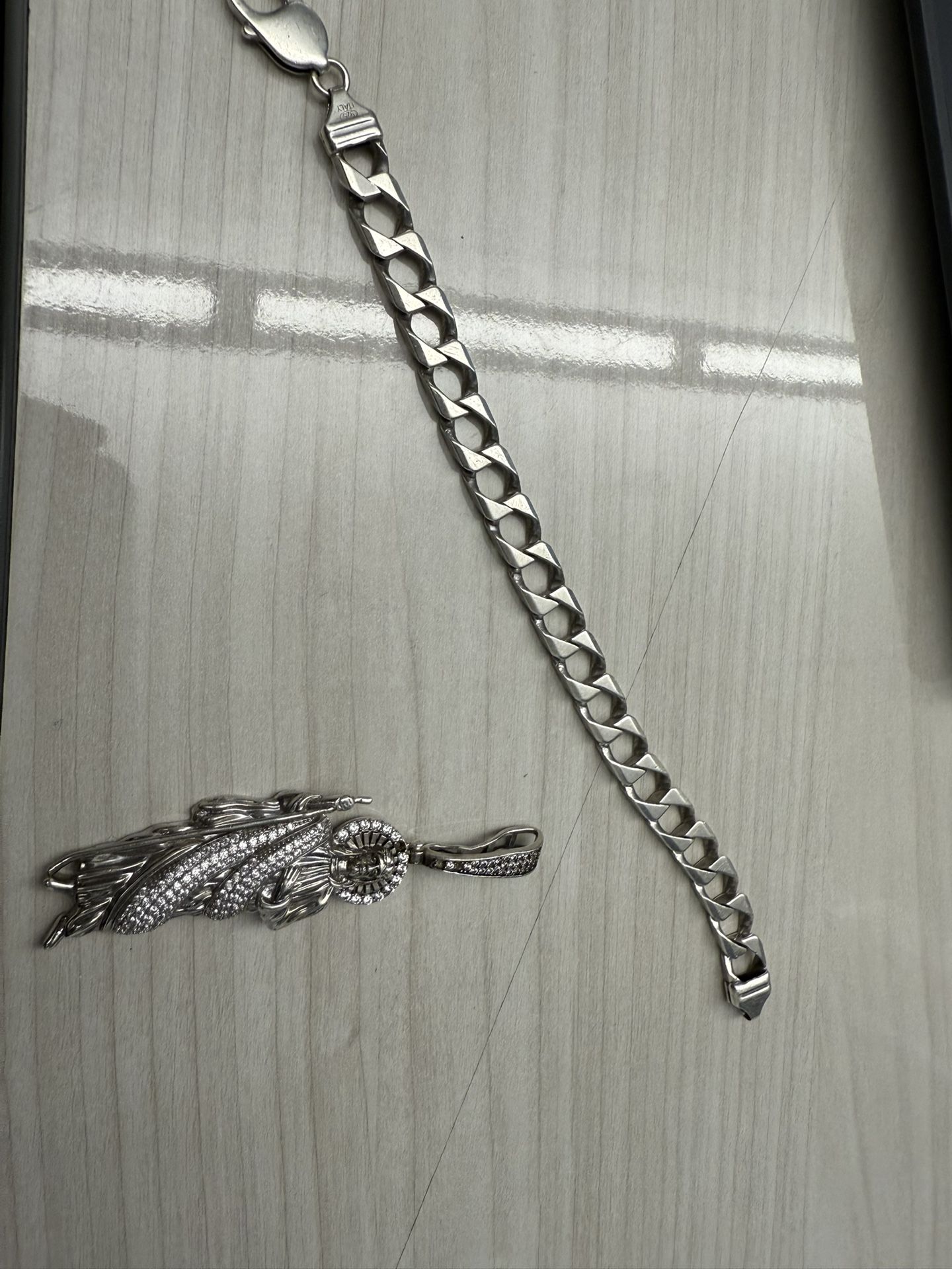 Silver bracelet pendant