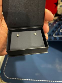 .25 ct diamond earrings new in box