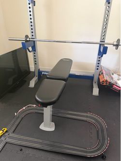 Bench Squat Rack with Barbell and Weights