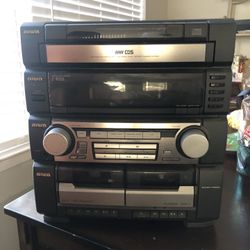 Radio, CD Player, Cassette player, Turn Table, and speakers