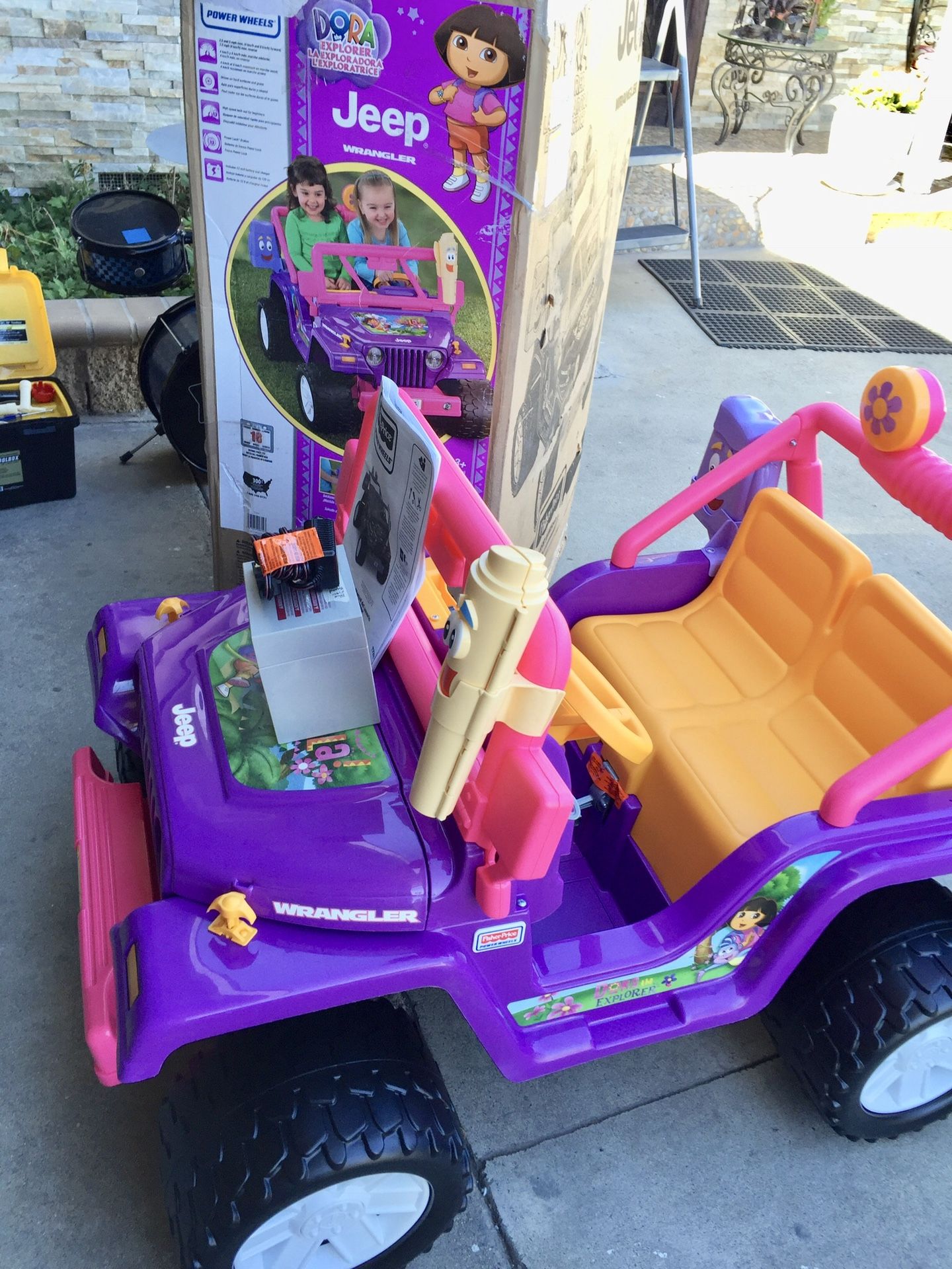 Dora best sale power wheels
