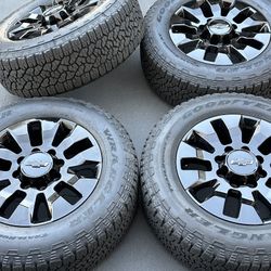 20” Chevy Silverado 2500 factory wheels and tires gloss black new 3500