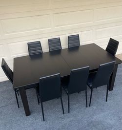 9-PC LARGE BLACK DINING SET (IKEA TABLE AND 8 PADDED LIGHT WEIGHT CHAIRS)