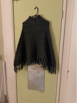 Dark green knitted poncho