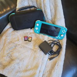 Nintendo Swtich Lite With Case And 2 Games!!