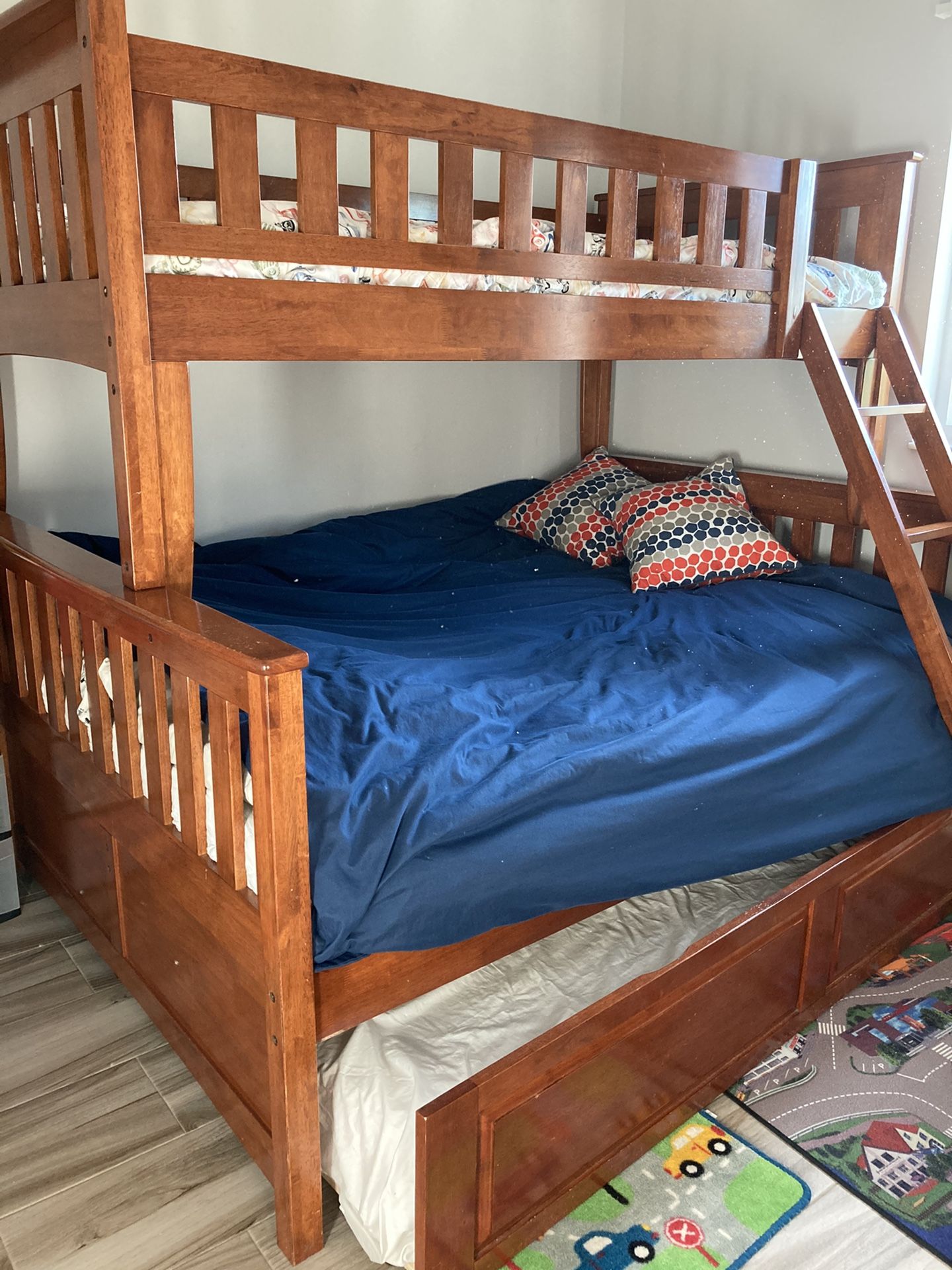 BUNK BED (3 beds) WITH 1 full mattress and 1 twin.