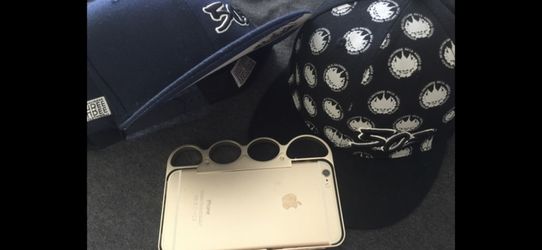 iPhone 6+ gold + aluminum brass knuckles case no iCloud locked fully working but has cracked screen