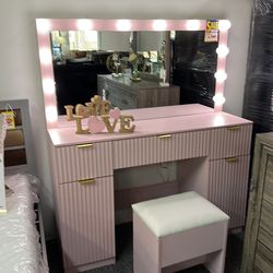 Pink vanity with led bulbs
