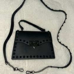 Black spiked bag with removable shoulder strap