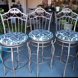 stools with patterned cushions 