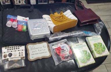 Pampered chef bag, 2 purses, dominoes, 2 trinket maker kits, shot glasses, party decors and a cane