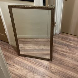 Large gold mirror