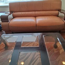 Three pieces furniture couches loveseat and chair and  coffee table