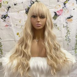 Human hair blend light blonde wig.