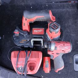 Milwaukee 12V Band saw + 12V impact Driver/ with battery and charger/for $275( delivery available)