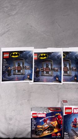 Spider-Man LEGO sets and Batman LEGO sets, all brand new and never opened.