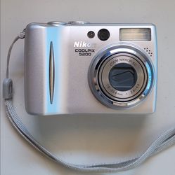 Nikon Coolpix 5200 Digital Camera Silver W/ Original Charger, 2 Original Batteries and SD Card Tested Working