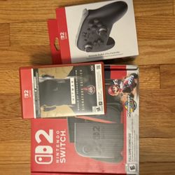 Nintendo switch 2 with pro controller and game