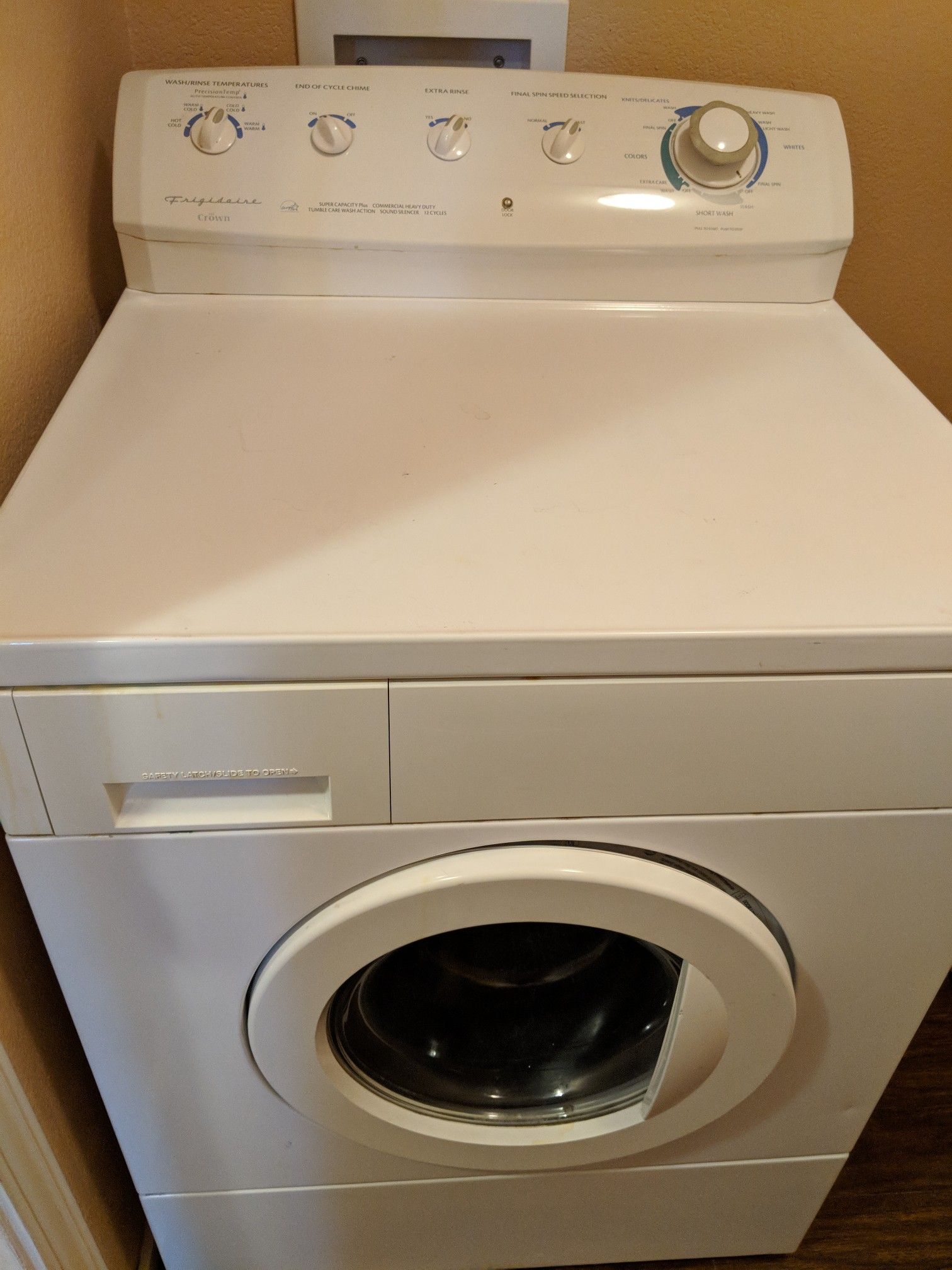 Frigidaire crown HD front load washer with matching gas dryer. Clean